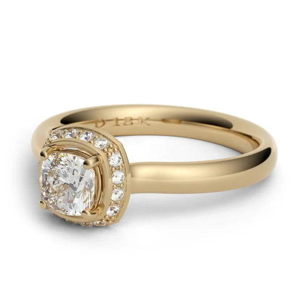 Cushion cut engagement ring with hidden diamond halo, custom made in Calgary by Ian Davidson