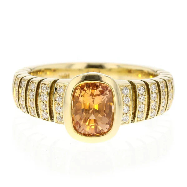 Orange sapphire and diamond ring in 18k gold, bespoke commission by Davidson Jewels Calgary