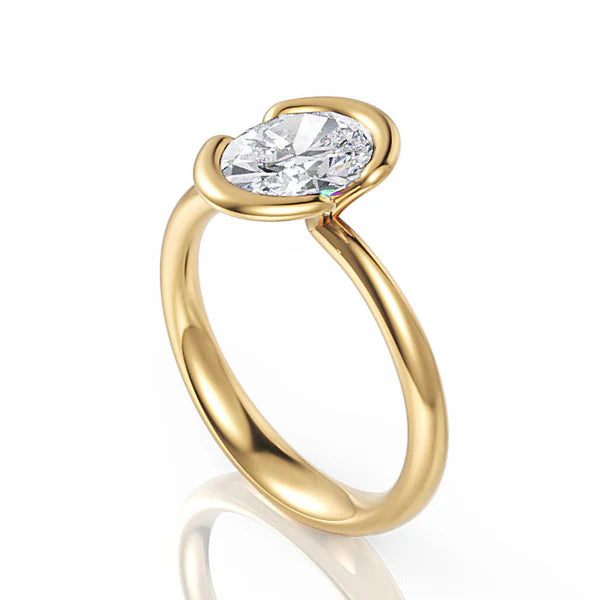 Oval diamond solitaire engagement ring with split shank in 18k white gold, Davidson Jewels Calgary